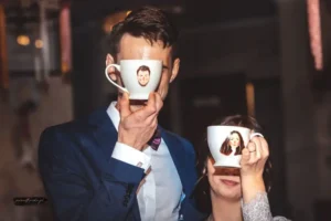A mug with a portrait of the newlyweds in an illustrative style