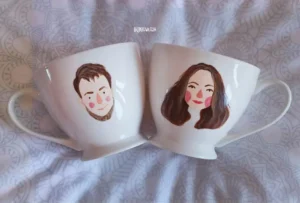 Hand-painted wedding mug with portraits of the newlyweds